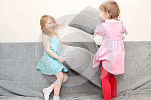 Children pillows fighting