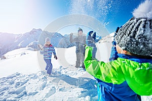 Children play action fun snowball winter game