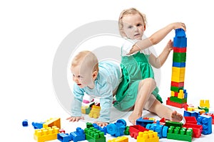 Children play with blocks in studio