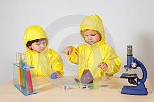 Children play chemists game at home