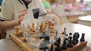 Children play chess. Children play educational games in a preschool.