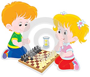 Children play chess photo