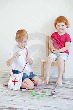 Children play doctor and patient