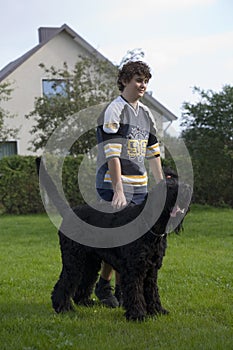 Children play with dog