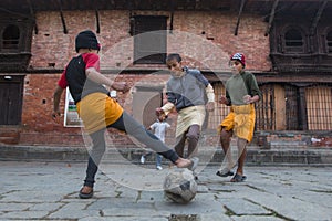 Children play football after lesson at Jagadguru School.