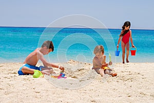 Children play at island beach