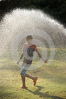 Children play with jets of water