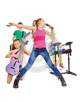 Children play musical instruments and girl sings