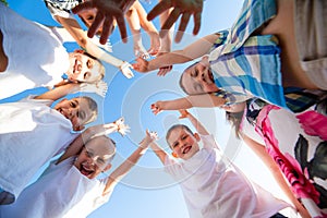 Children play outdoors running and having fun