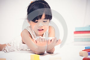 Children play Phone on white background.