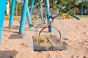 Children play on the playground swings