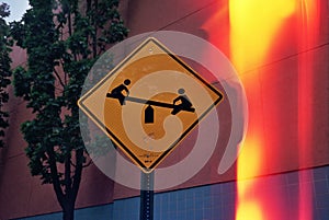 Children at Play Sign with Color Light Abstraction from filmstock