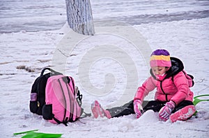 Children play with snow