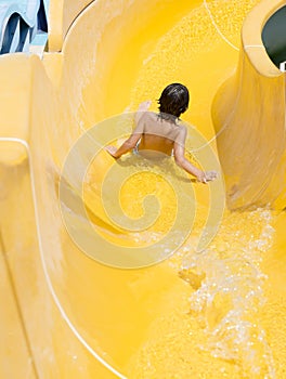 Children play on the water slide