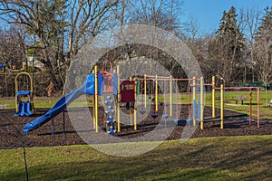 Children playground activities in public park without children . Colorful Safe modern children`s playground.