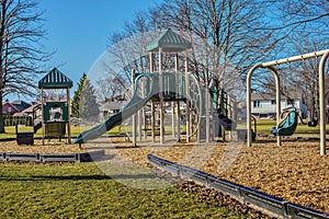 Children playground activities in public park without children . Colorful Safe modern children`s playground.