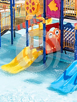 Children Playground with Colorful Yellow And Blue Plastic Slider in Swimming Aquapark