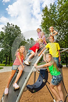 Children on playground construction play together