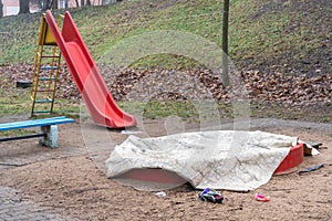 Children Playground with Covered Sandbox and Abandoned Toys