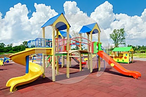Children playground equipment. Colorful playground empty. Outdoor playground set. Play area. Play yard. Children slide