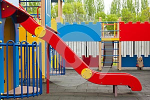 Children playground with slide. Kid`s colorful area.Modern children playground in park