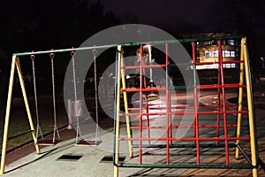 Children playground swings and ladders