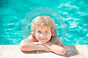 Children playing and active leisure, swimming pool concept. Kids happy om summer. Kid learn to swim. Healthy outdoor