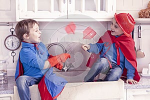 Children playing at being wonderful hero photo