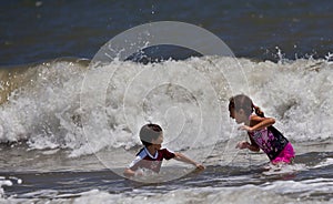 Children Playing in the Big Surf