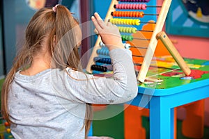 Children playing in the children& x27;s area of the store without parents