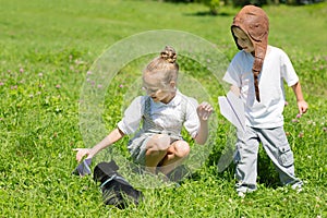 Children playing with the dog, French bulldog