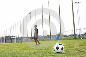 Children playing football on the field