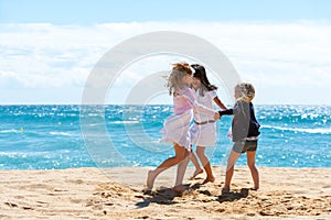 Children playing game on beach.