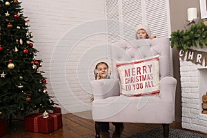 children playing hide and seek christmas decorations