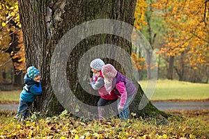 Children playing hide and seek photo