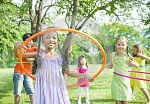 Children Playing With Hoola Hoops