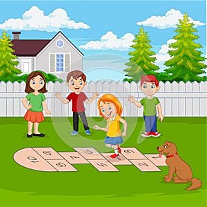 Children playing hopscotch in the park