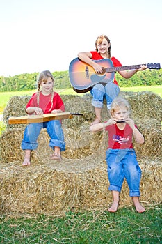 Children playing instruments.