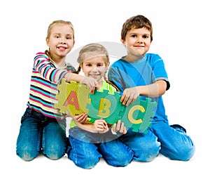 Children are playing letters