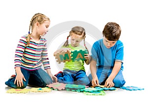 Children are playing letters