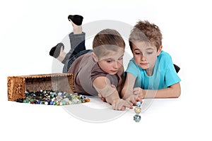 Children playing with marbles