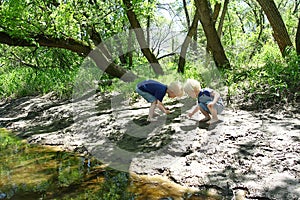 Children Playing Outside at the River