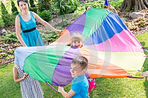 Children playing parachute games