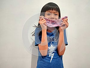 Children playing playdoh or slime photo