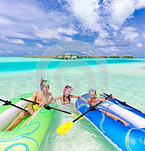 Children playing with rafts photo