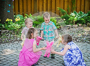 Children Playing Ring Around the Rosie Game