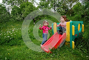 Children playing on slide