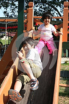 Children playing slide