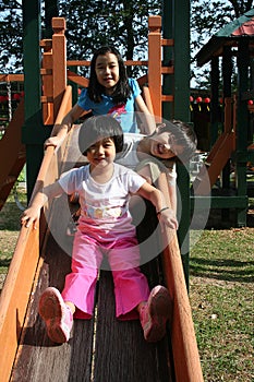 Children playing slide