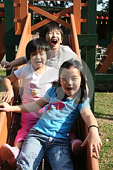 Children playing slide